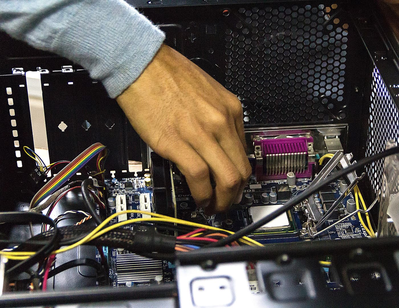 Technician servicing computer hardware