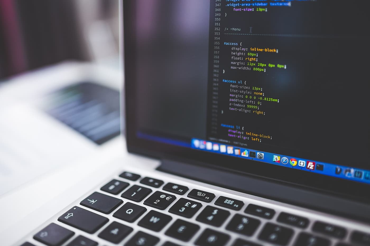 Source code on a developer's laptop screen